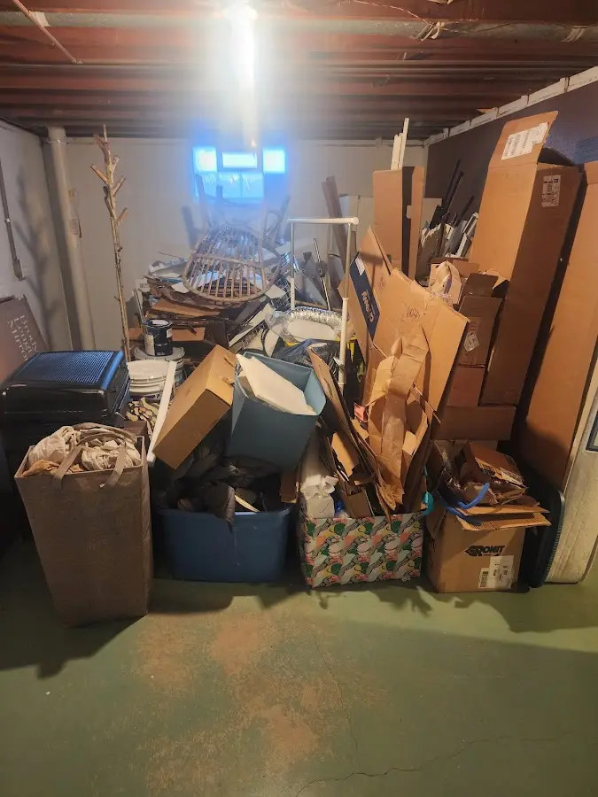 Roll-off dumpster container at job site for 4 Yard Dumpster Rental in Daphne